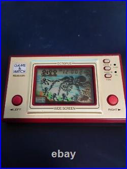In hand Nintendo Game Watch Octopus Console OC-22 Used Wide screen