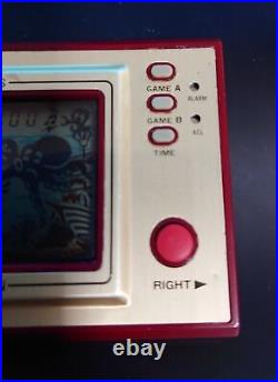 In hand Nintendo Game Watch Octopus Console OC-22 Used Wide screen
