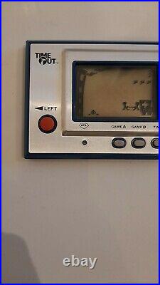 Time out fireman handheld vintage nintendo game and watch 80s