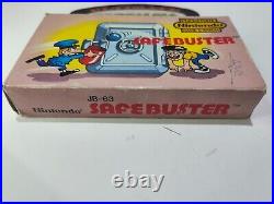 Vintage Nintendo Game & Watch Safebuster (JB-63) has Original Protection Film